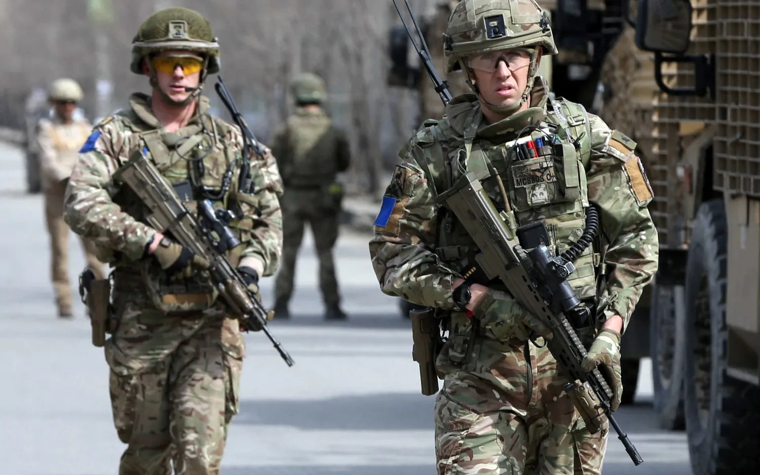 FILE - British soldiers with NATO-led Resolute Support Mission arrive at the site of an attack in Kabul, Afghanistan, March 6, 2020. Reuters