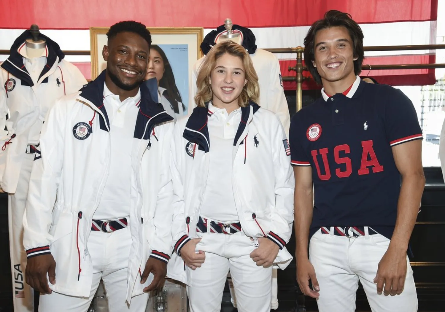 Athletes Daryl Homer (Fencing), left, Jordyn Barratt (Skateboard) and Heimana Reynolds (Skateboard) participate in the Team USA Tokyo Olympic closing ceremony uniform unveiling at the Ralph Lauren SoHo Store on April 13, 2021, in New York. (AP)