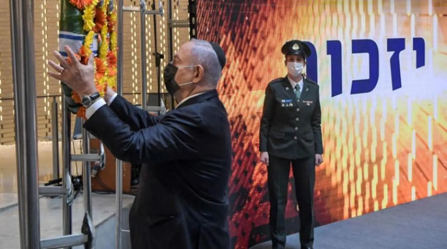 14 April 2021, Israel, Jerusalem: Israeli Prime Minister Benjamin Netanyahu lays a wreath during an official ceremony at Mount Herzl military cemetery. dpa