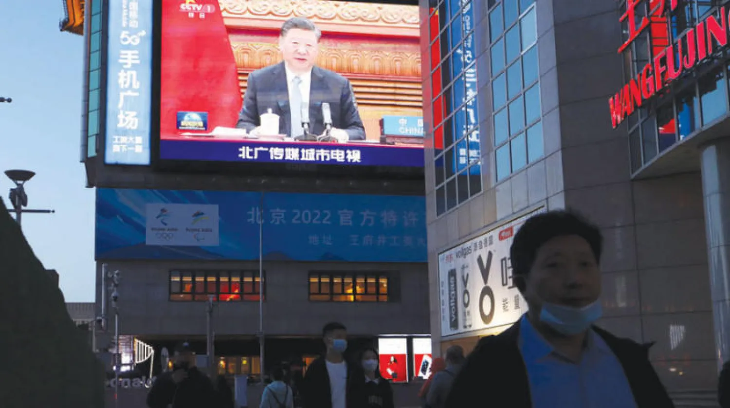 مشاركة الرئيس الصيني في قمة مناخ افتراضية مع ميركل وماكرون الجمعة (رويترز)