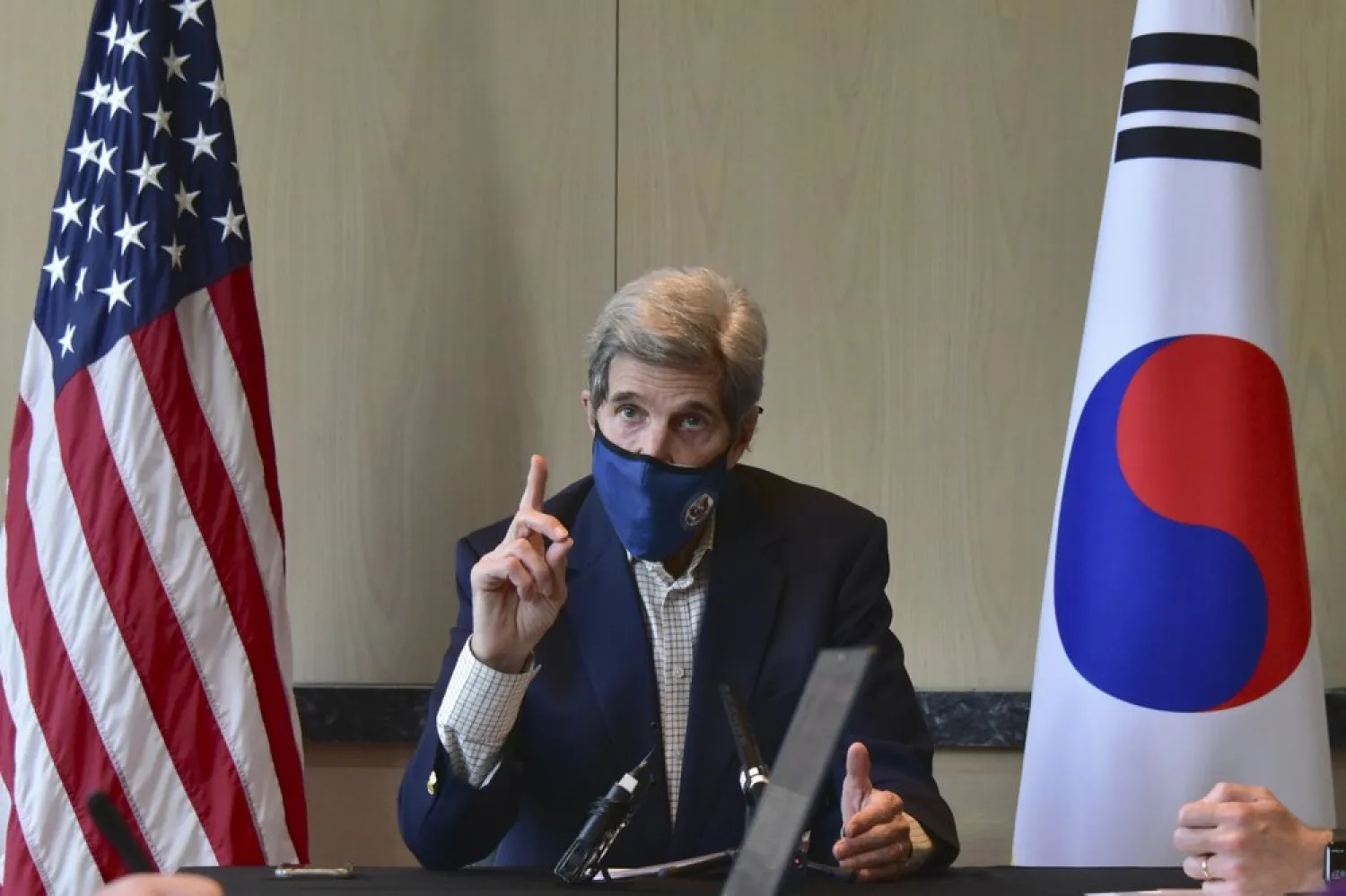 In this photo provided by US Embassy Seoul, US special envoy for climate John Kerry speaks during a round table meeting with the media in Seoul, South Korea, Sunday, April 18, 2021. (AP)