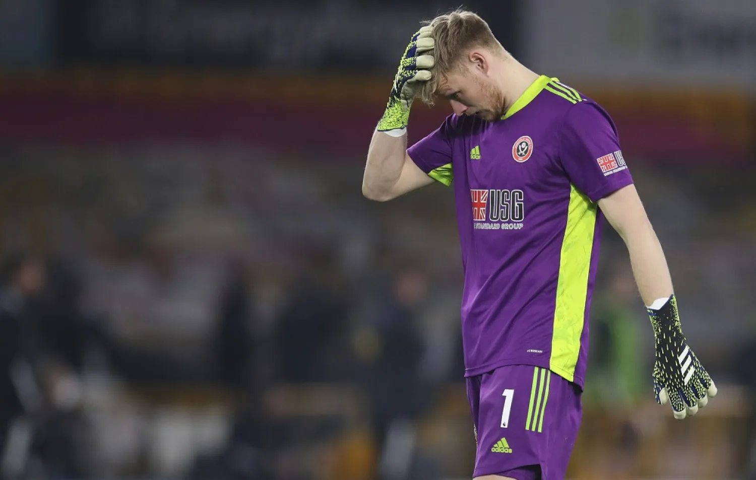 Sheffield United’s goalkeeper Aaron Ramsdale reacts after the match against Wolves at the Molineux Stadium in Wolverhampton, England, Saturday, April 17, 2021. (AP)