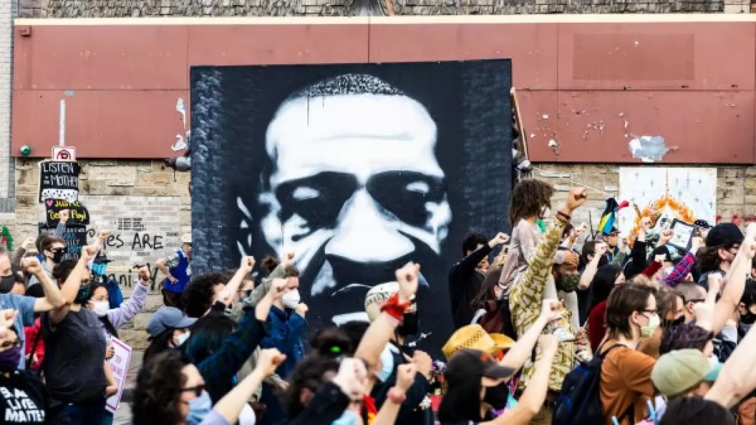 Demonstrators near the George Floyd Memorial in Minneapolis, Minnesota | AFP
