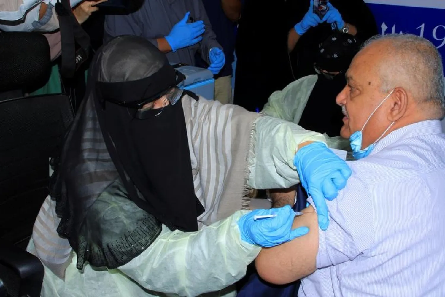 Minister of Civil Service Abdul-Nasser al-Wali, receives the AstraZeneca vaccine against the coronavirus disease (COVID-19), at a medical center in Aden, Yemen April 20, 2021. (Reuters)