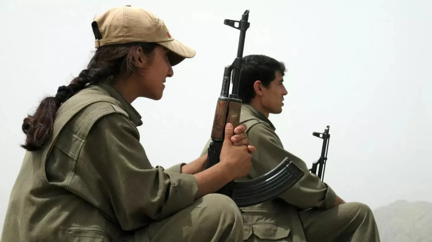 PKK fighters resting in an undisclosed mountainous region in Turkey near the border with Iraq in May 2013. (AFP)