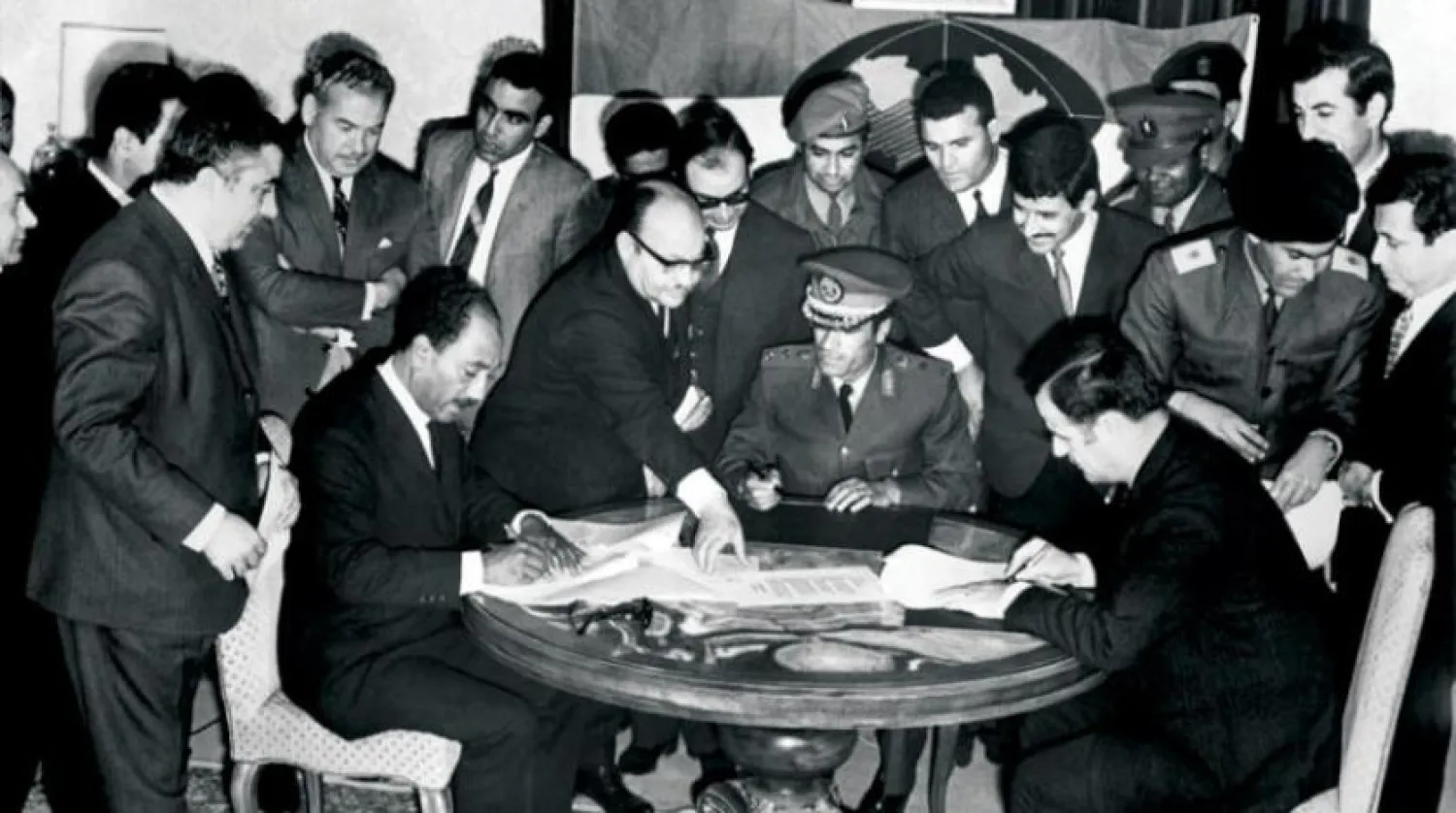 Gaddafi (center) with Egyptian President Anwar Sadat and Syrian President Hafez al-Assad during the signing of the agreement to establish the Union of Arab Republics in Benghazi in 1971 (Getty Images).