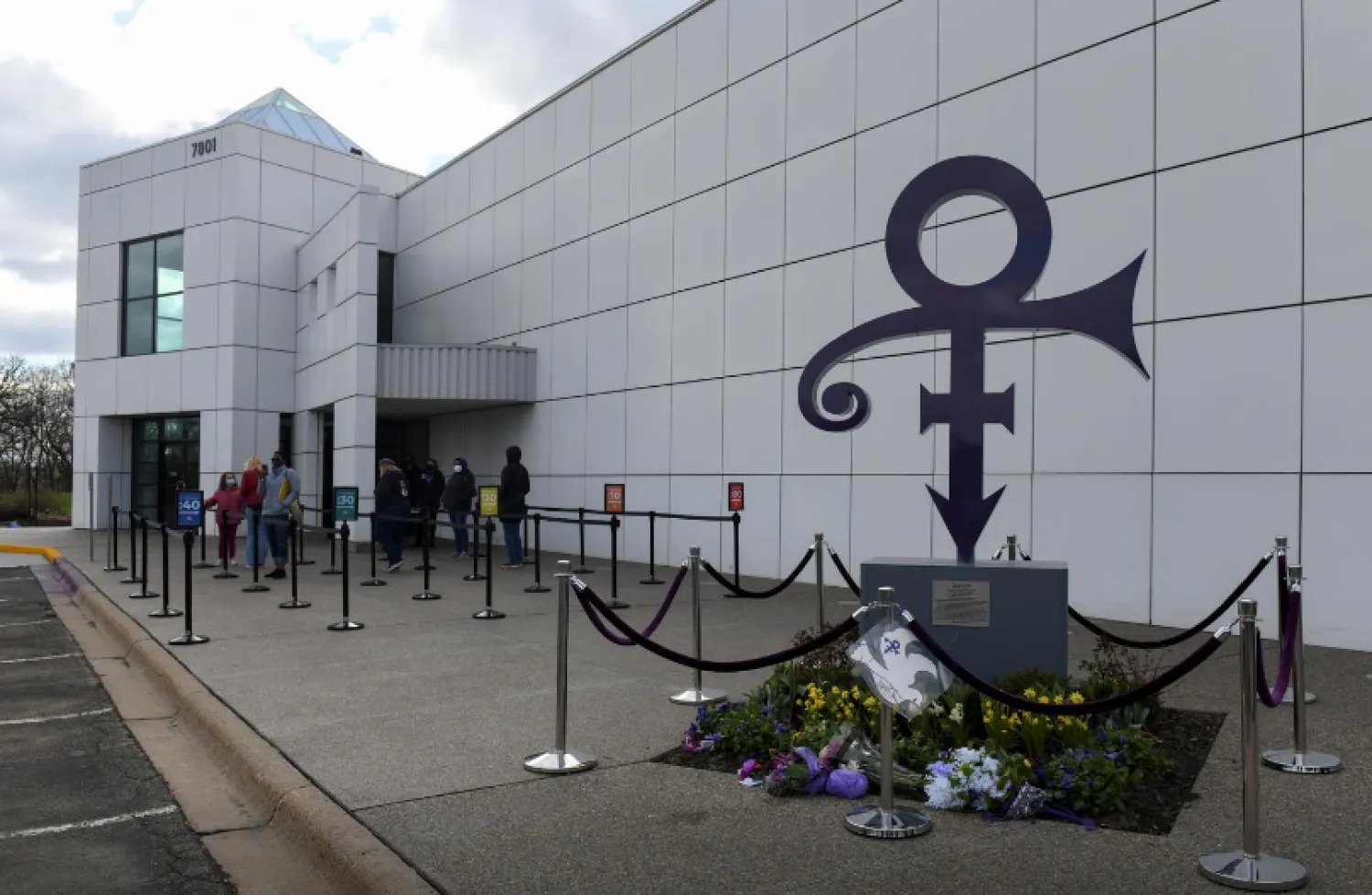 Visitors wait in line outside Paisley Park on the fifth anniversary of Prince's death in Chanhassen, Minnesota, US, April 21, 2021. REUTERS/Nicholas Pfosi
