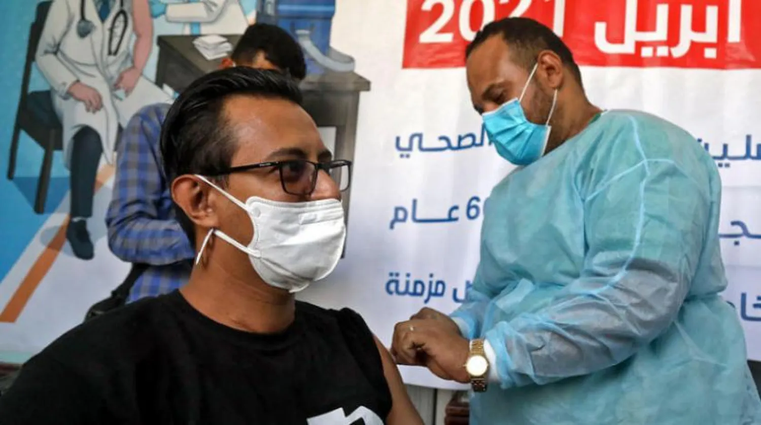 A Yemeni man receives a vaccine shot in Taiz. (AFP)
