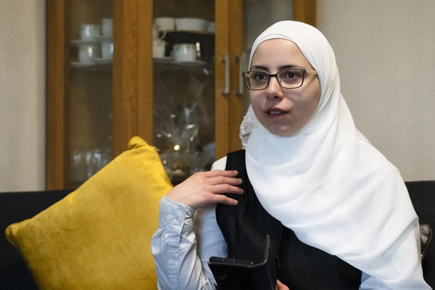 Faeza Satouf, a Syrian refugee who was granted asylum in Denmark in 2015, talks to The Associated Press during an interview in Nivaa, Denmark, Wednesday, April 21, 2021. (AP)