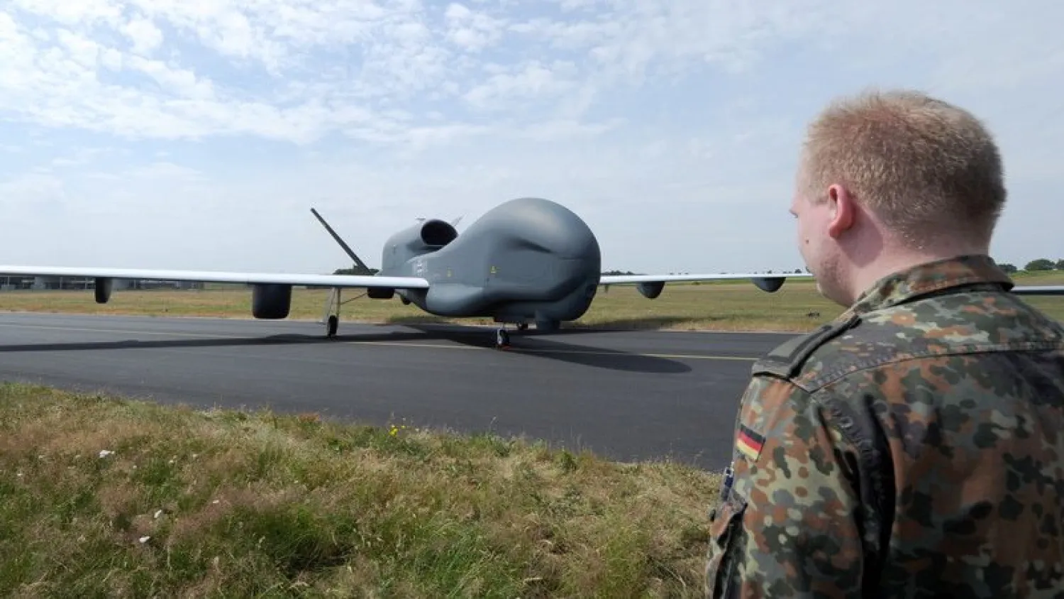 The drone "Euro Hawk" stands on the airfield of the reconnaissance squadron 51 "Immelmann" in Jagel, Germany, 8 July 2010. (EPA)