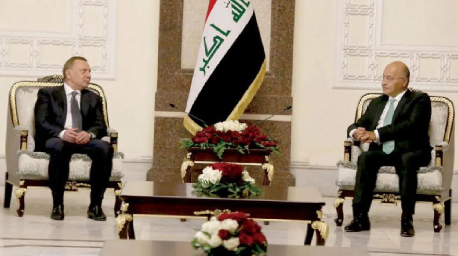 The Iraqi president during talks with the Russian deputy prime minister in Baghdad. (Iraqi presidency)