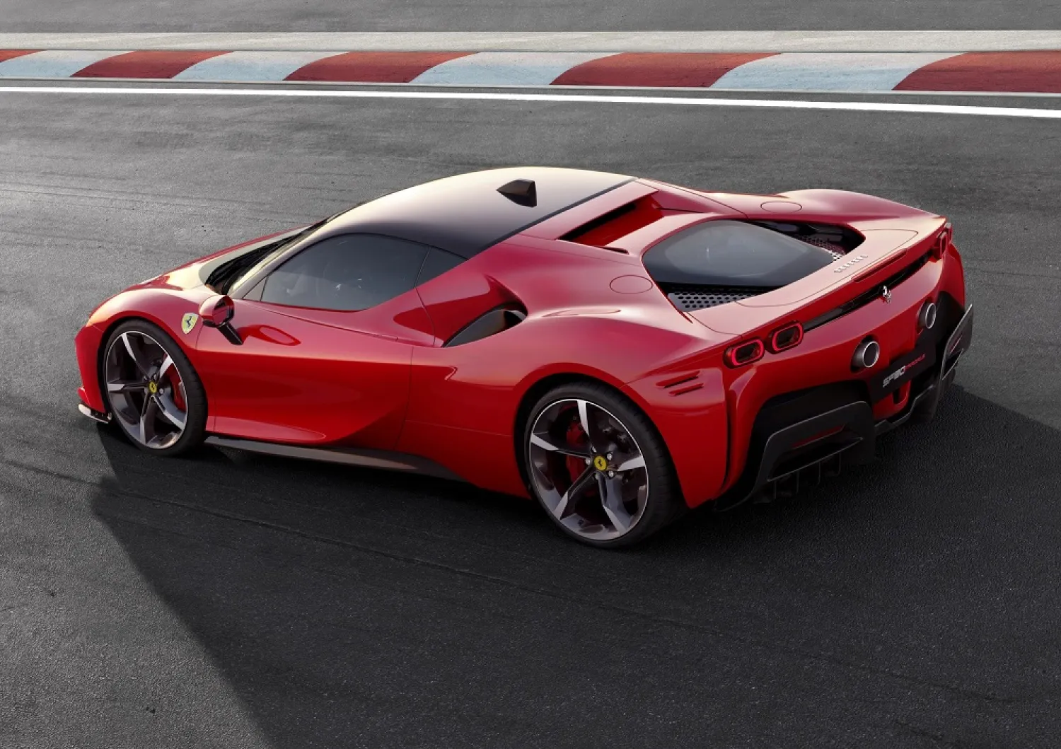 Ferrari's SF90 Stradale hybrid sports car is displayed at the company's base in Maranello, Italy. (Reuters)