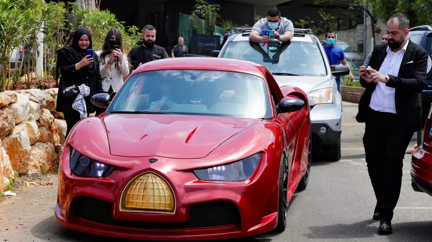 The car has a golden logo of the Dome of the Rock, the shrine in Jerusalem's al-Aqsa mosque compound, Islam's third holiest site. (AFP)