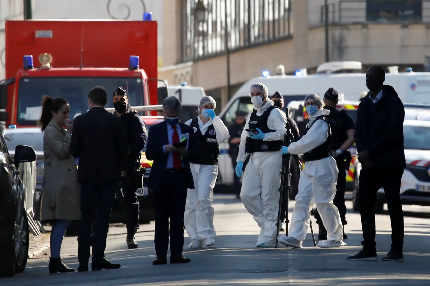 Police officers secure the area where an attacker stabbed a female police administrative worker, in Rambouillet, near Paris, France, April 23, 2021. REUTERS/Gonzalo Fuentes