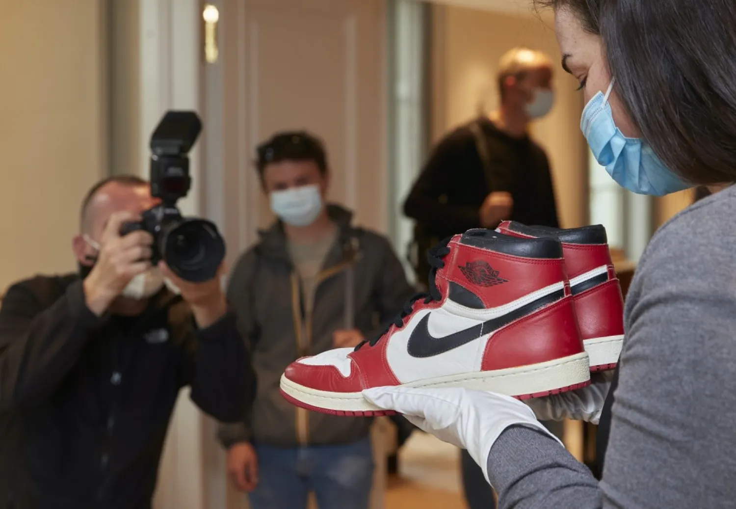 The auction house has estimated the red and white Air Jordan 1 sneakers at 100,000-150,000 Swiss francs ($110,000-$164,000). (Reuters)