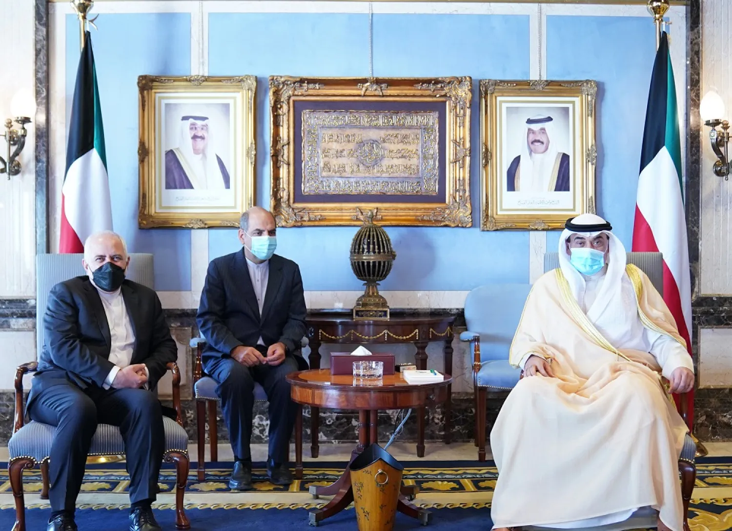 Prime Minister Sheikh Sabah Khaled Al-Hamad Al-Sabah holds talks with Zarif in Kuwait. (KUNA)