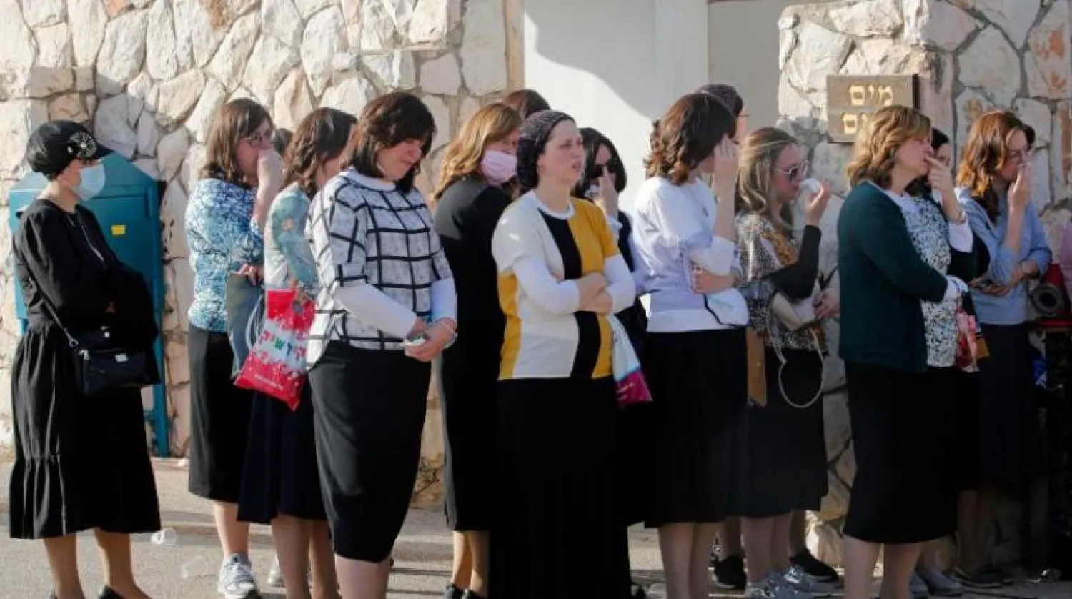 Cenaze töreninde İsrail'deki izdiham kurbanlarının bazı aileleri (AFP)
