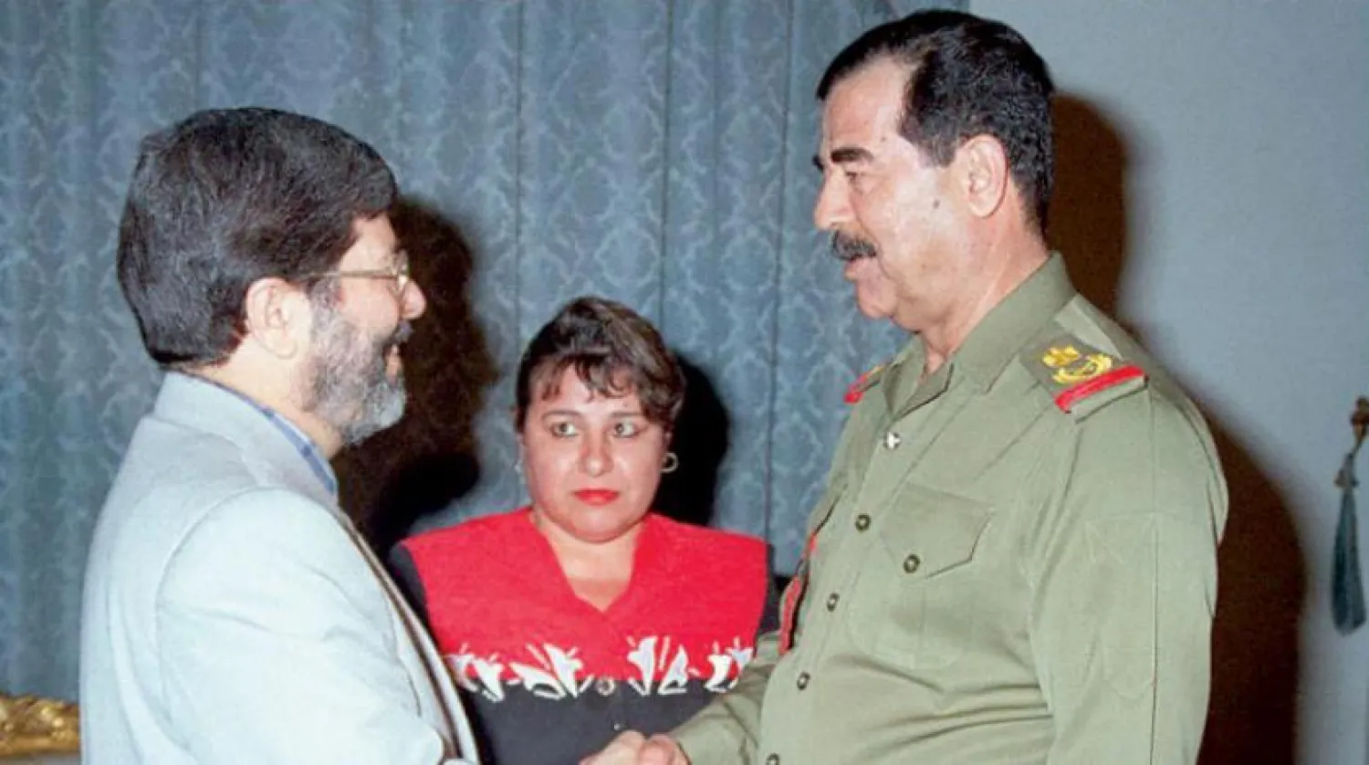 Saddam Hussein and Iran's Health Minister in 1997 (Getty Images - AFP)