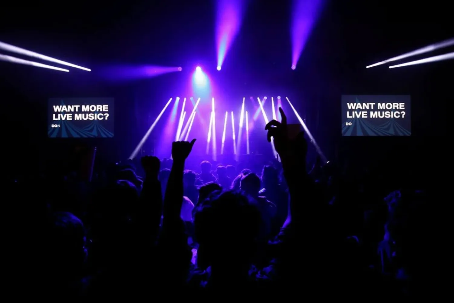 People attend a test music festival as part of a national research program assessing the risk of COVID-19 transmission in Liverpool, Britain May 2, 2021. (Reuters)