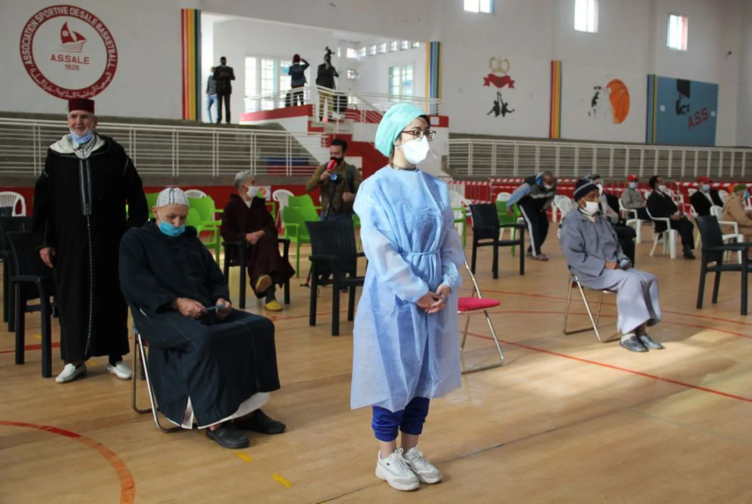 People wait to receive the COVID-19 vaccine, during a national coronavirus vaccination campaign, in Sale, Morocco January 29, 2021. (Reuters)