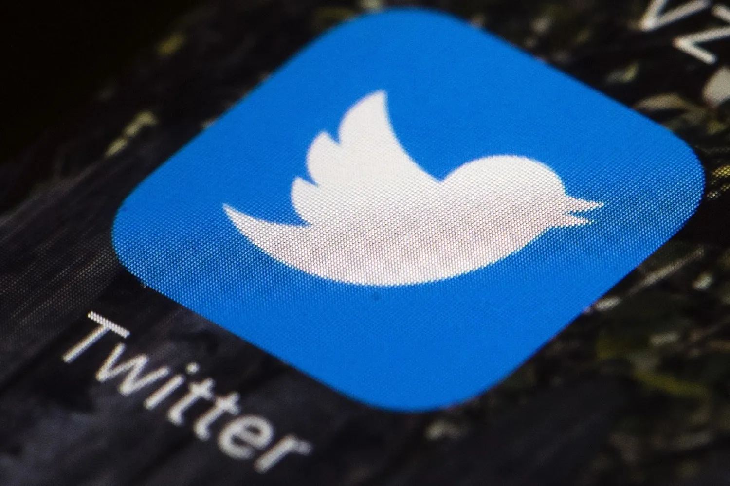 This file photo shows the Twitter app icon on a mobile phone. (AP)