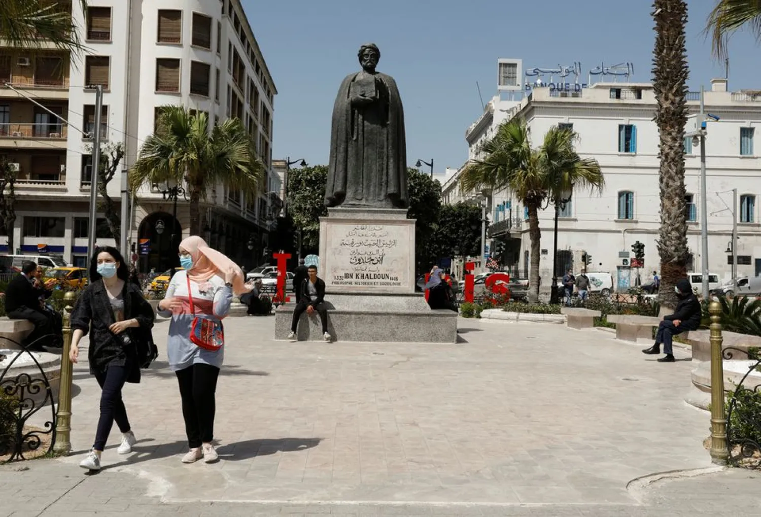 People walk in the center of Tunis, amid the coronavirus disease (COVID-19) outbreak, Tunisia, April 29, 2021. (Reuters)