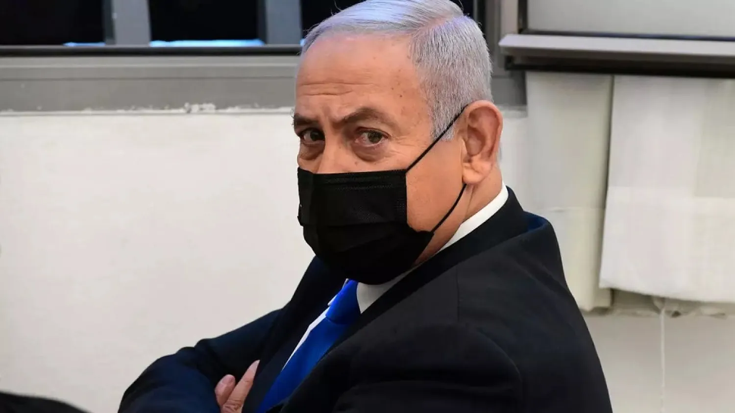 Israeli Prime Minister Benjamin Netanyahu looks on prior to a hearing at the district court in Jerusalem, Monday, Feb. 8, 2021. (AP)