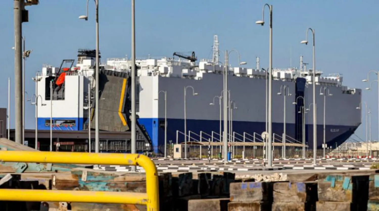 The Israeli-owned Bahamian-flagged MV Helios Ray cargo ship at Port Rashid in Dubai for damage assessment after an attack at sea in February. (AFP)