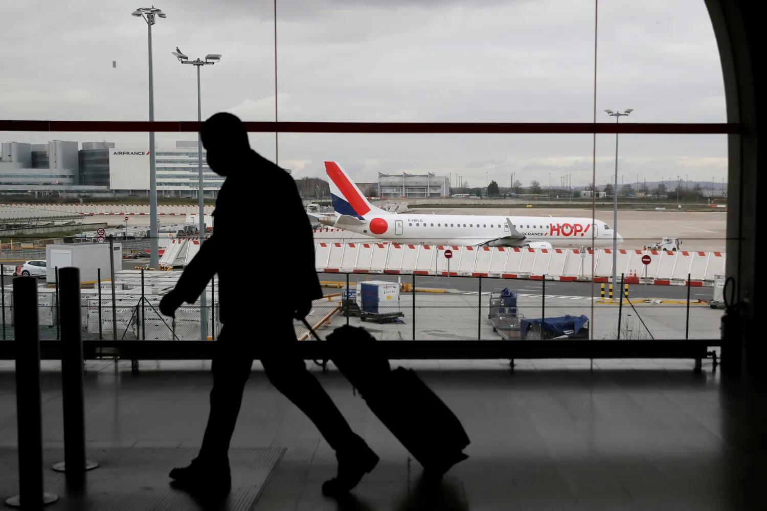 A man walks inside a Terminal at Paris Charles de Gaulle airport in Roissy near Paris. Reuters