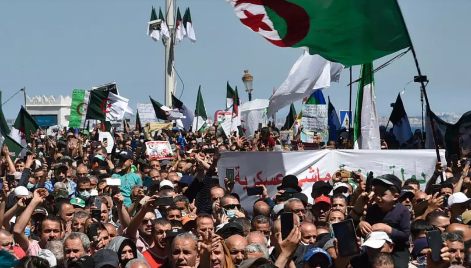 Algerians shout slogans during an anti-government demonstration in the capital Algiers on May 7, 2021. AFP