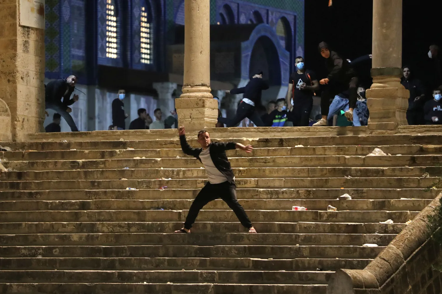 Israeli police fired rubber bullets and stun grenades towards rock-hurling Palestinian youth at Jerusalem’s Al-Aqsa Mosque on Friday amid growing anger over the potential eviction of Palestinians from homes on land claimed by Jewish settlers.
