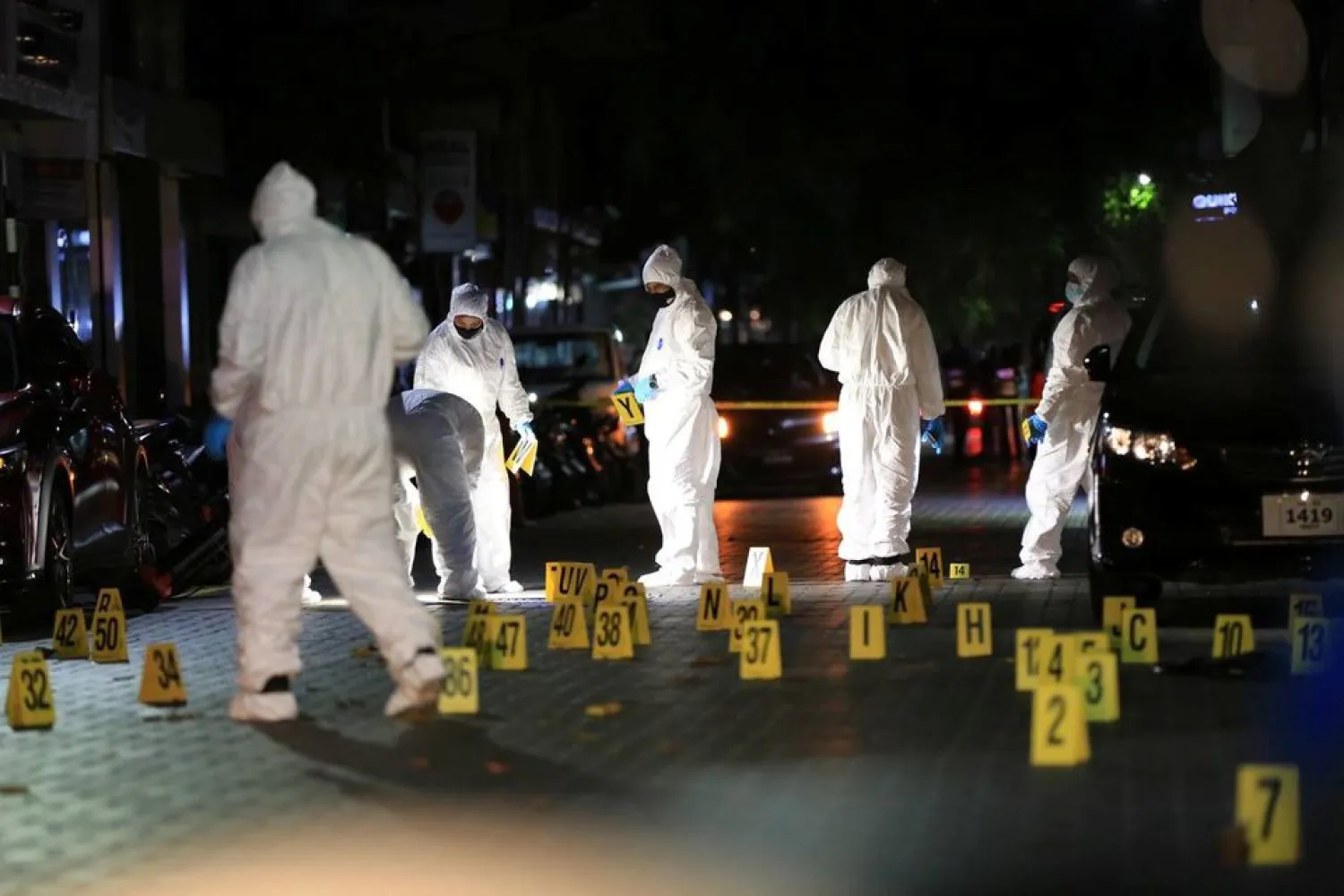 Maldivian police officers inspect the area after a blast outside the family home of the speaker of parliament, former President Mohamed Nasheed, in Male, Maldives April 6, 2021. Maldives Police Service/Handout via REUTERS