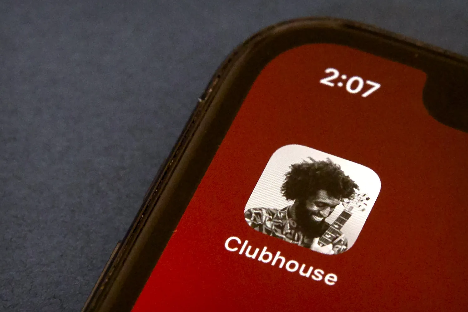 The icon for the social media app Clubhouse is seen on a smartphone screen in Beijing, Tuesday, Feb. 9, 2021. (AP Photo/Mark Schiefelbein)