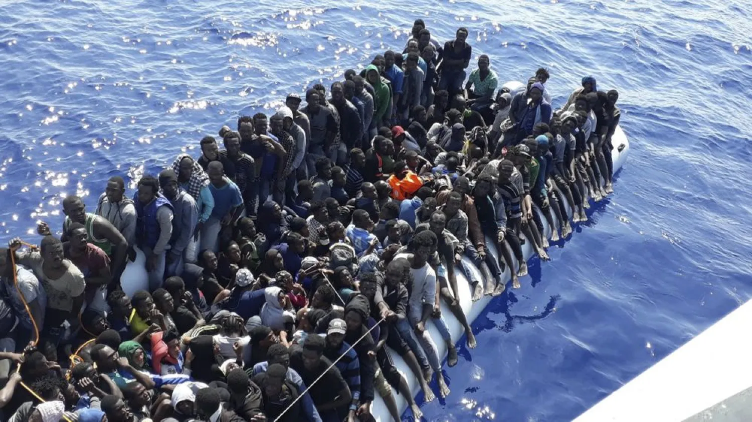 This Sunday, June 24, 2018 photo released by the Libyan Coast Guard shows migrants on a ship intercepted offshore near the town of Gohneima, east of the capital, Tripoli. (Libyan Coast Guard via AP)
