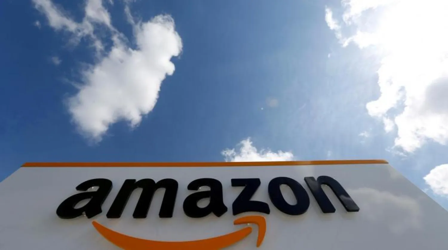 FILE PHOTO: The logo of Amazon is seen at the company logistics center in Boves, France, May 13, 2019. REUTERS/Pascal Rossignol/File Photo
