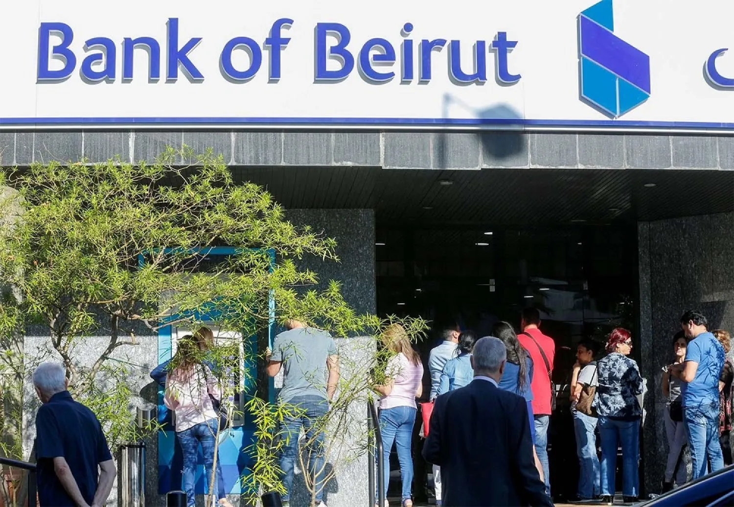 Banks froze customers out of their deposits and blocked them from transferring cash abroad since the financial crisis erupted in late 2019. (Reuters)