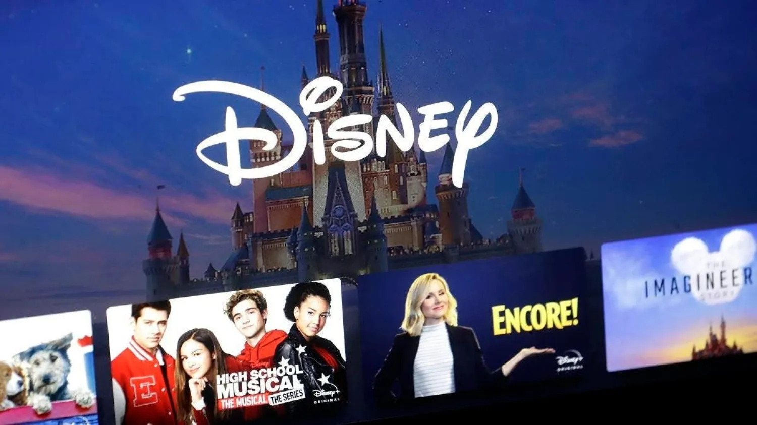A Disney logo forms part of a menu for the Disney Plus movie and entertainment streaming service on a computer screen. (AP)