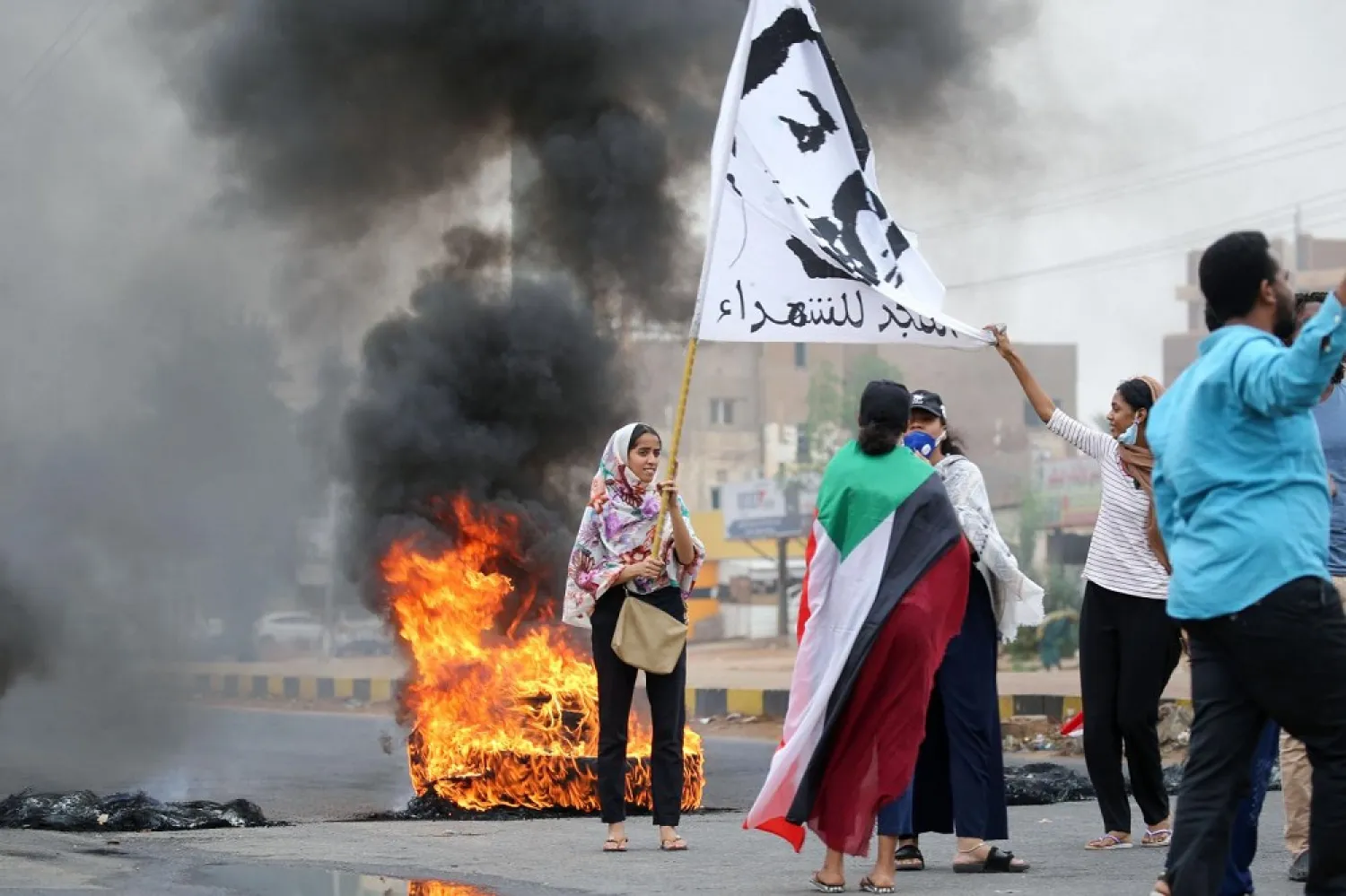 A Sudanese protester during a demonstration in Khartoum, on May 23, 2020, to commemorate the first anniversary of June 3 massacre. (AFP)