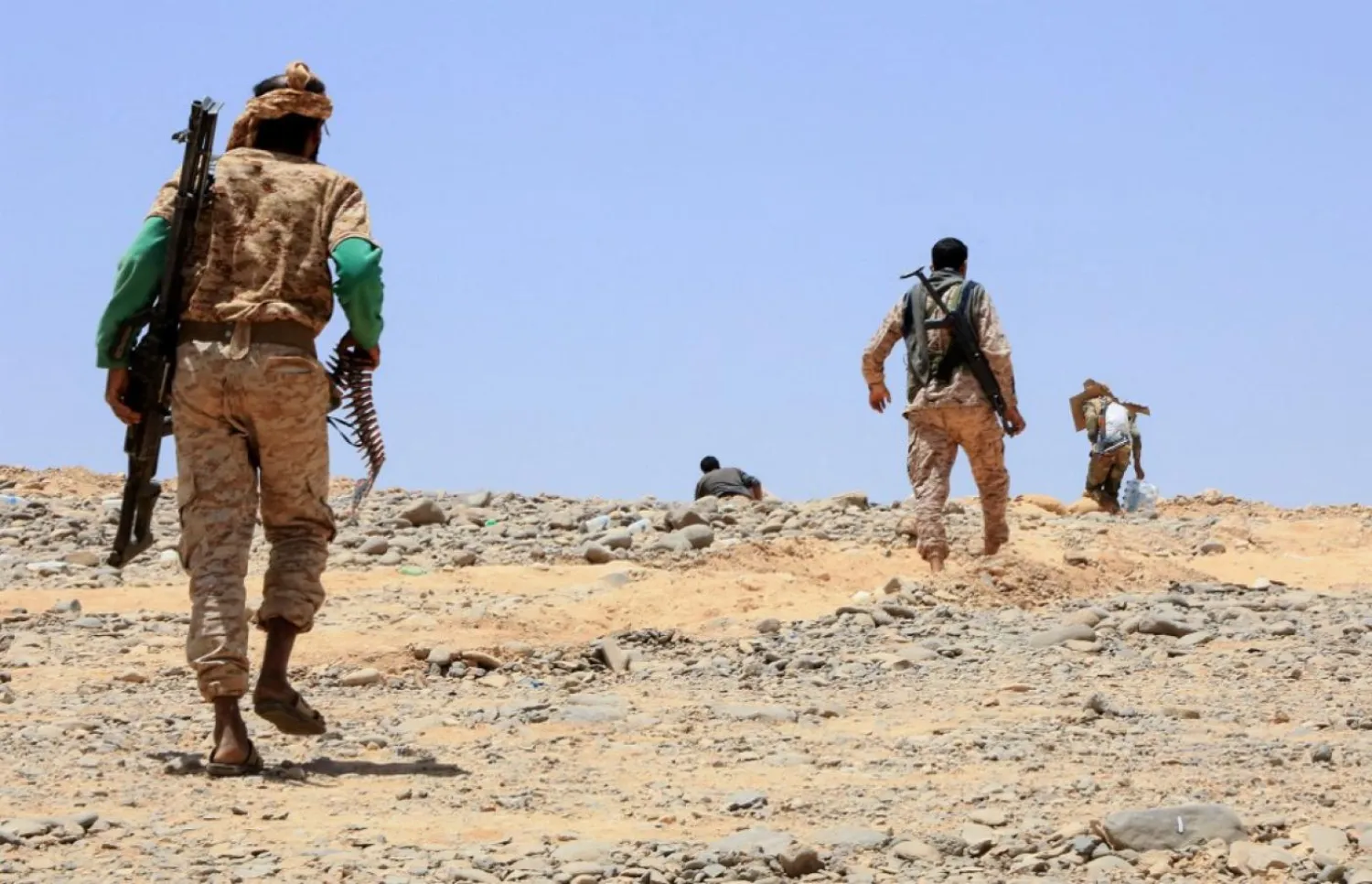 Forces loyal to the Yemeni government hold a position against Houthis in Marib (AFP)
