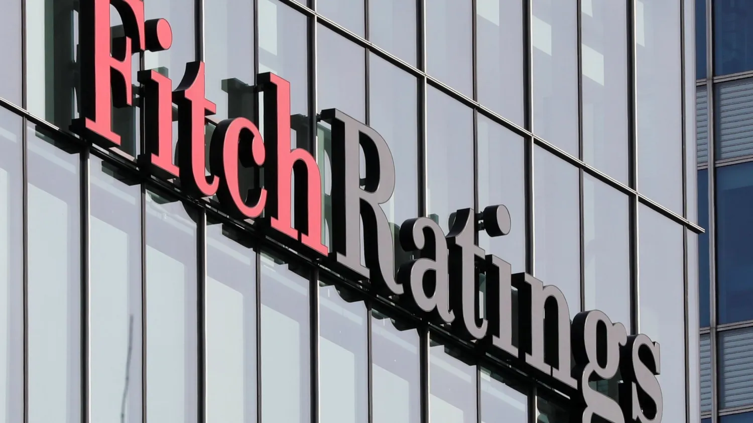 FILE PHOTO: The Fitch Ratings logo is seen at their offices at Canary Wharf financial district in London, Britain, March 3, 2016. REUTERS/Reinhard Krause