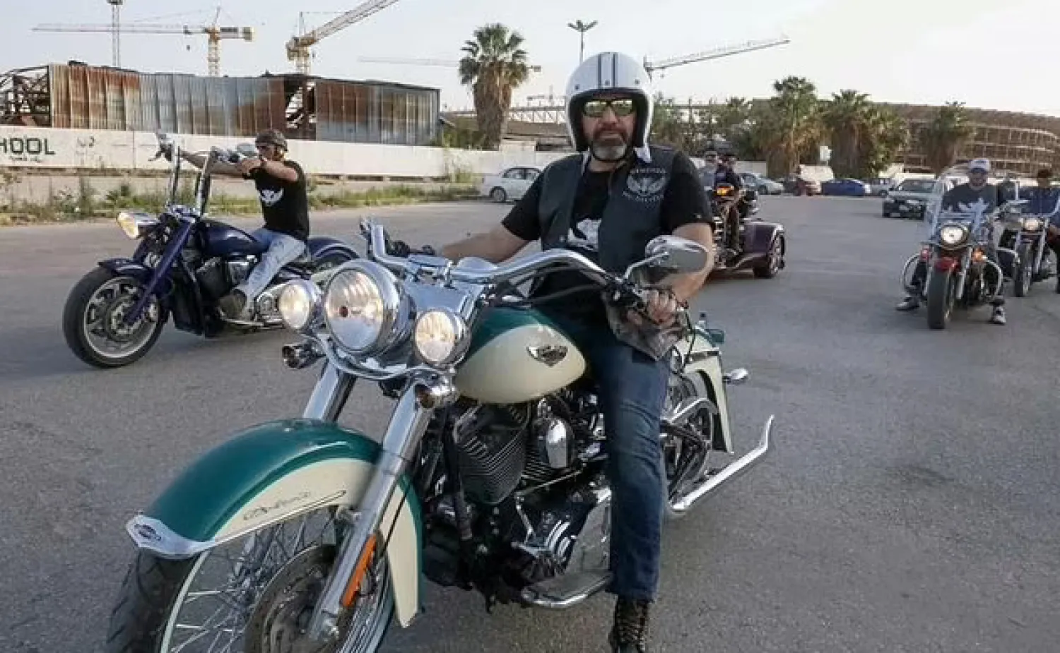 Libyan bikers parade through the streets of the eastern city of Benghazi, the cradle of the 2011 revolution - AFP

