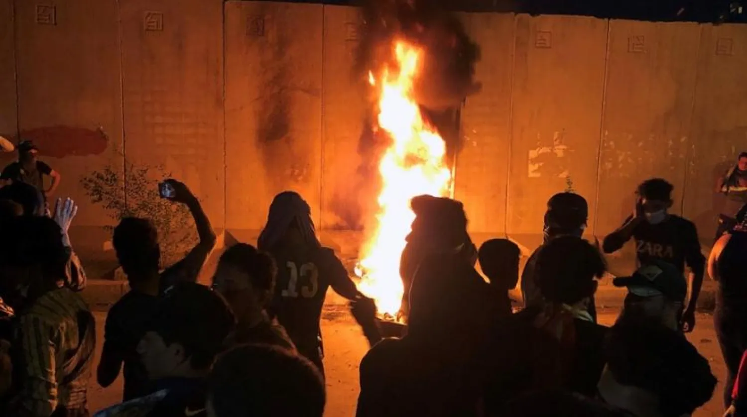 Demonstrators set fire to trash in front of the Iranian consulate, as they gather during anti-government protests in Karbala, Iraq November 3, 2019. (Reuters)