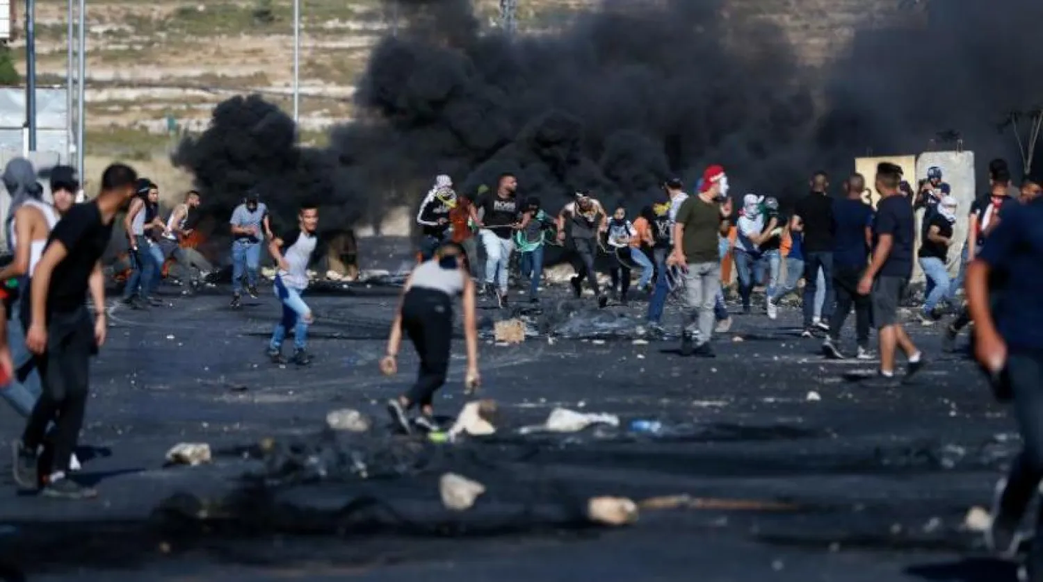 Batı Şeria’da Filistinli göstericiler ile İsrail güvenlik güçleri arasındaki çatışmalar (AFP)