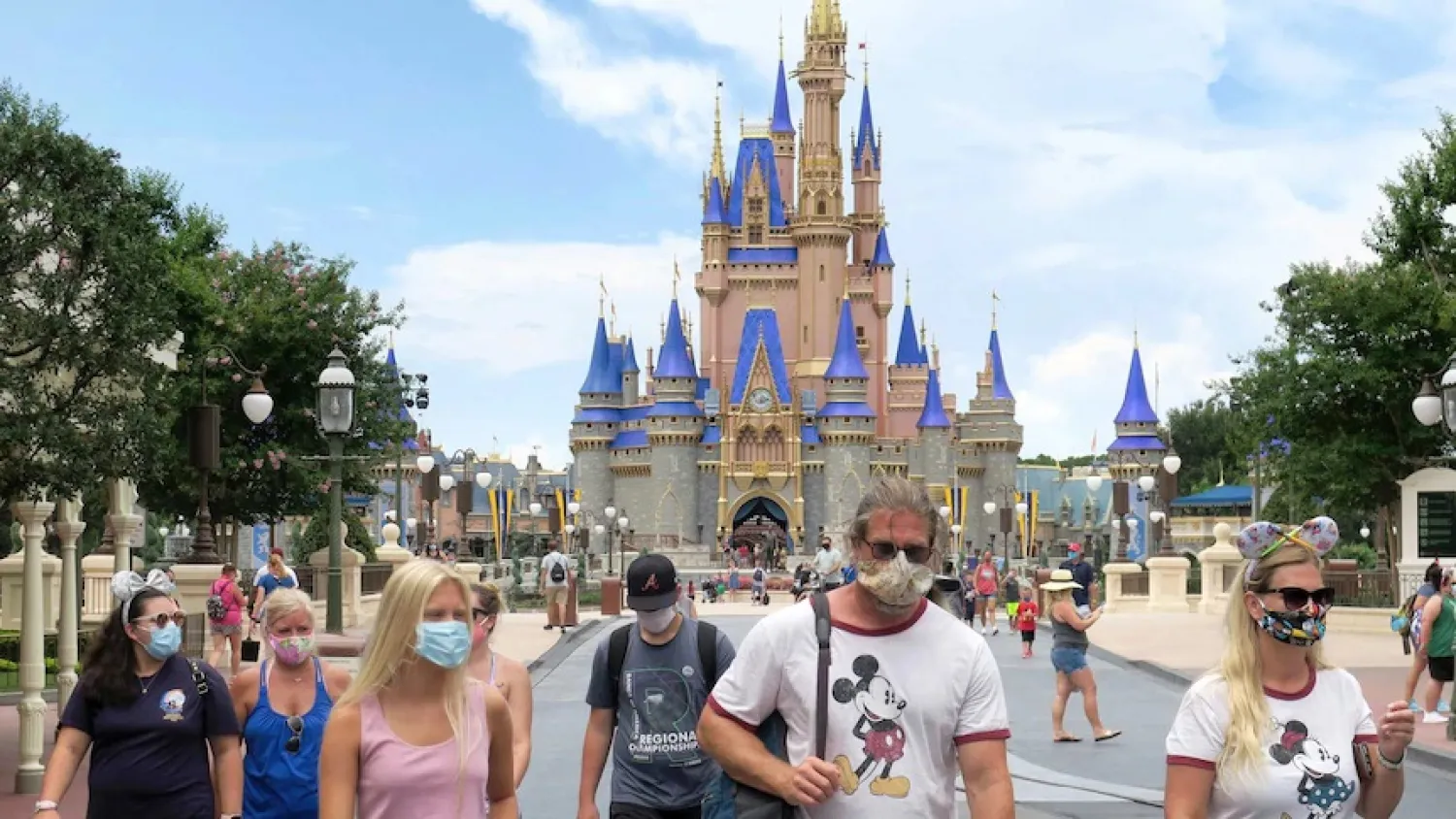 Disney World and other US amusement parks updated their mask policy following the latest guidance from the CDC this week. (AP)