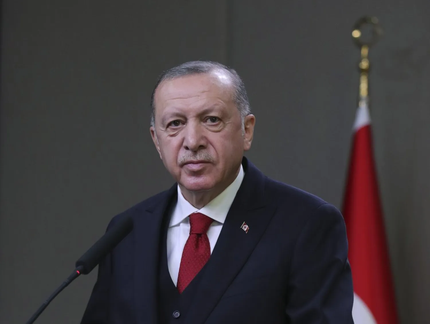 Turkey's President Recep Tayyip Erdogan speaks to reporters before departing for a visit to Azerbaijan, in Ankara, Turkey, Wednesday, Dec. 9, 2020. (Turkish Presidency via AP, Pool)
