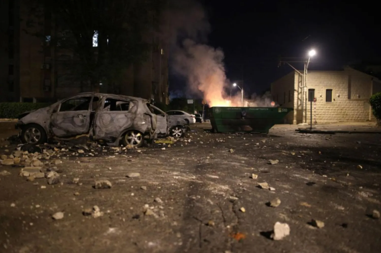 İsrail'in Gazze'ye düzenlediği saldırılarda hayatını kaybedenlerin sayısı 174'e yükseldi (AFP)