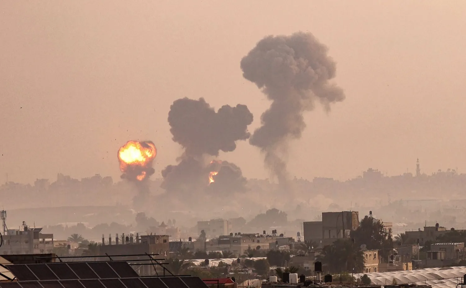 Fire and smoke billow from Israeli airstrikes in Khan Yunis, in the southern Gaza Strip, Palestine, May 11, 2021. (AFP)