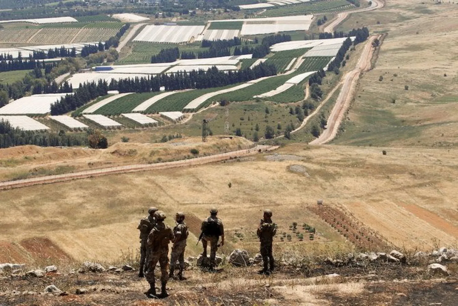 Lebanese soldiers stand in Maroun Al-Ras village, near the border with Israel, in southern Lebanon. (Reuters/File)
