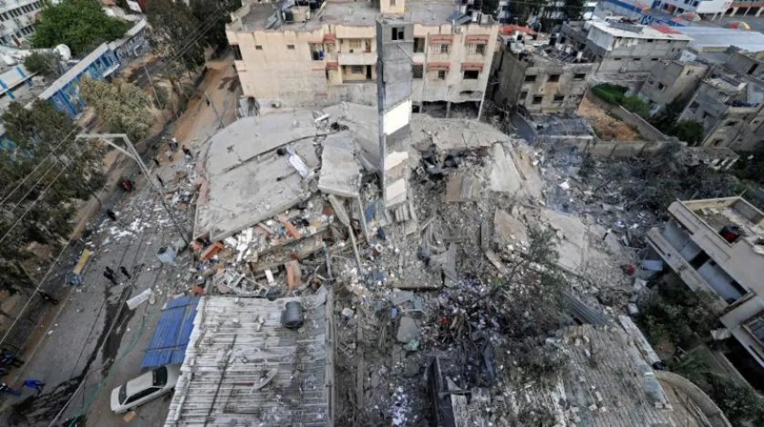 Gazze’de İsrail’in hava saldırıları sonucu yıkılan bir bina (AFP)