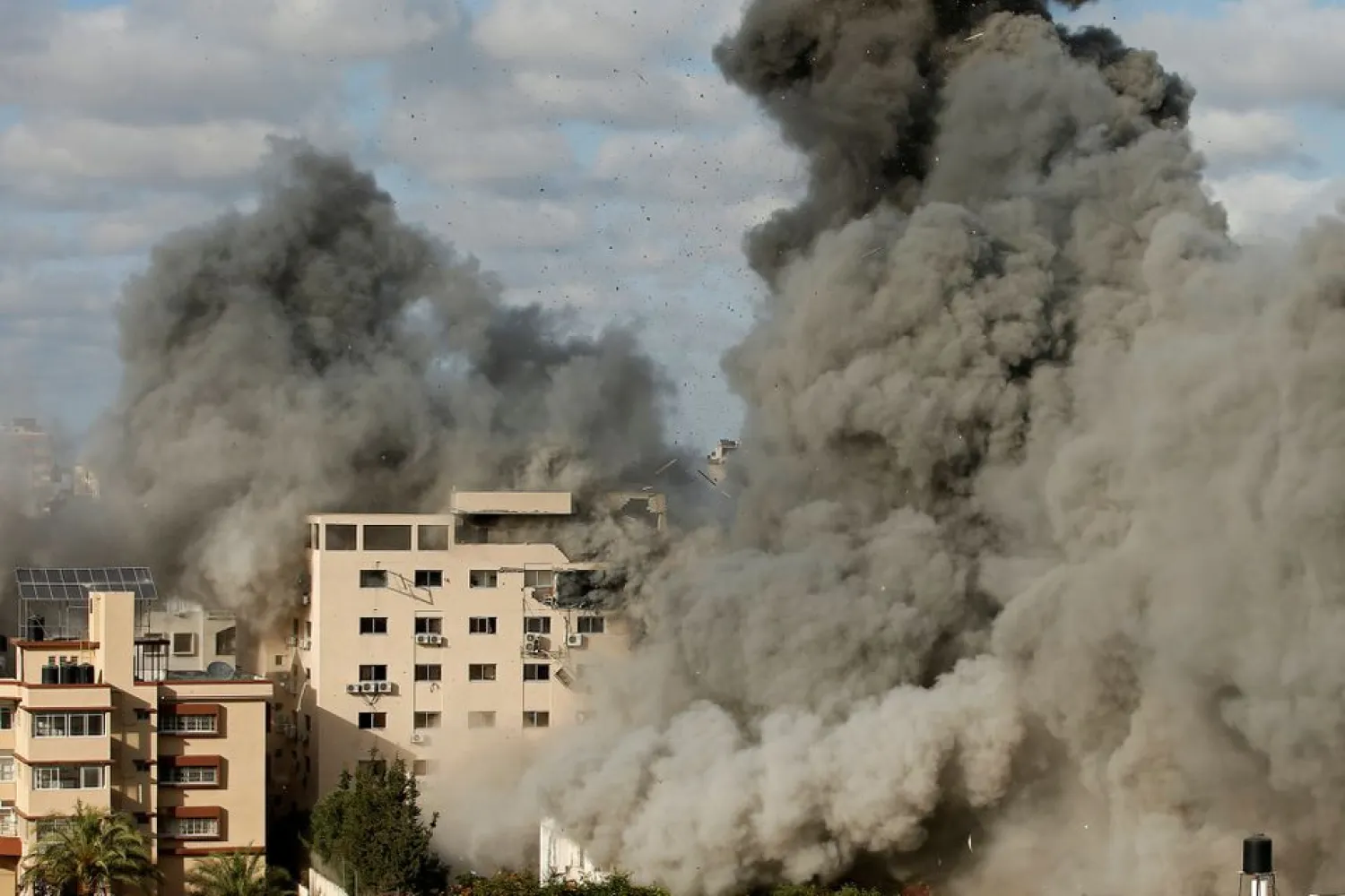 Smoke rises following an Israeli air strike on a building, amid a flare-up of Israeli-Palestinian fighting, in Gaza City May 17, 2021. (Reuters)